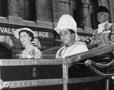 King Faisal II of Iraq and the queen leave Victoria Station in London for Buckingham Palace, in July 1956.  Getty