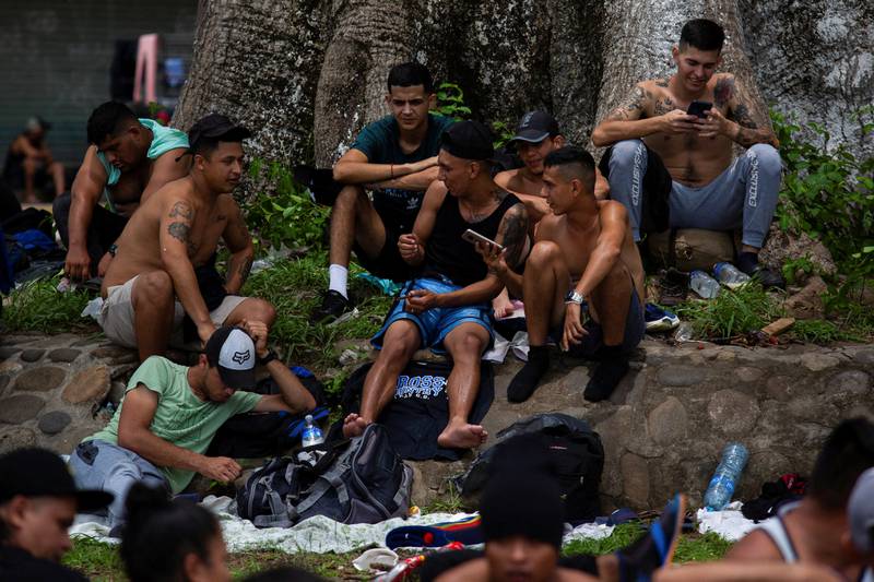 Migrants rest on the outskirts of Tapachula. Reuters