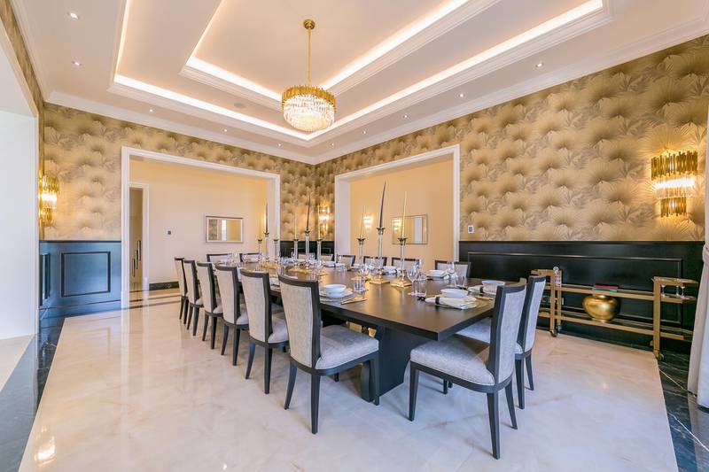 <p>The huge dining table can sit 16.&nbsp;Courtesy LuxuryProperty.com</p>

