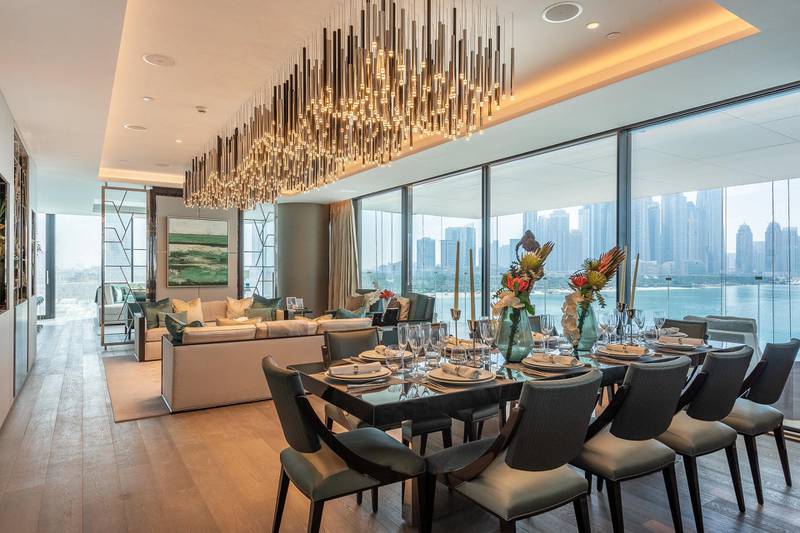 A living and dining area in the penthouse. Courtesy Gulf Sotheby's International Realty
