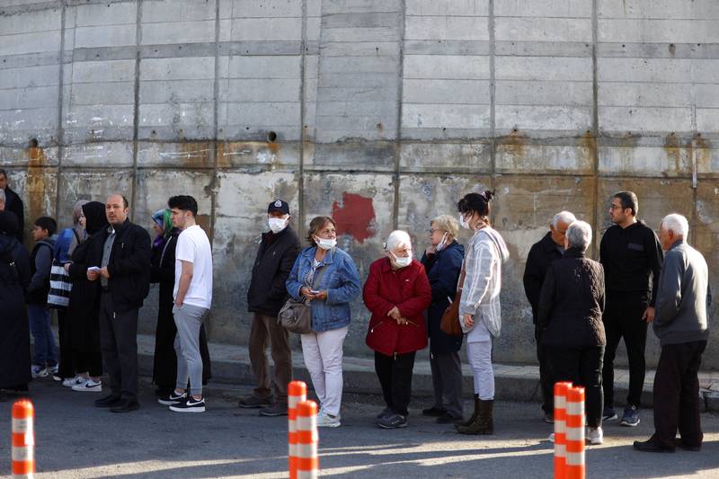 Voters queue outside a polling station in Istanbul. Reuters