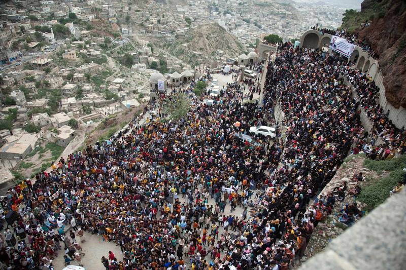 Yemenis gather at the historic 12th century citadel of al-Qahira in Yemen's third city of Taez, during the celebrations of the Muslim holiday of Eid al-Adha.