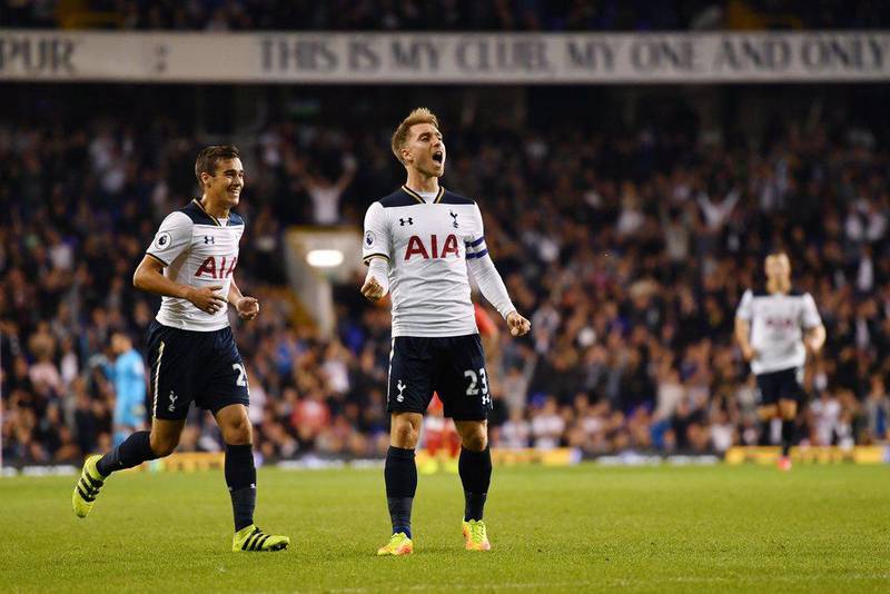 Christian Eriksen of Spurs celebrates scoring his side’s first goal with Harry Winks. Mike Hewitt / Getty Images