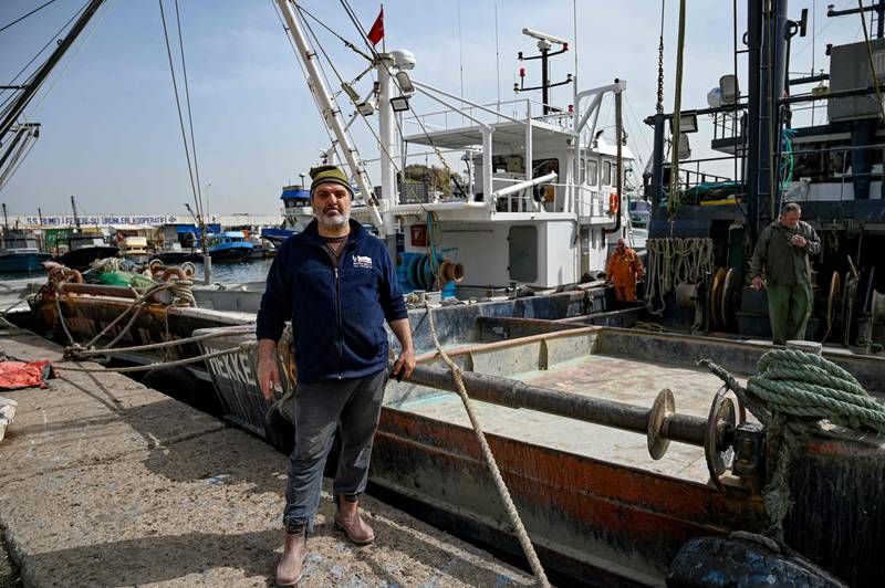 Fisherman and boat owner Sefki Deniz, 42, says '90 per cent of people that we know have stopped' going out to sea'. Turkish officials have banned fishing at night, and with the price of diesel reaching spectacular heights, many fishermen ended the fishing season three weeks early, a wise decision considering the recent discovery of stray mines in the Black Sea. All photos: AFP
