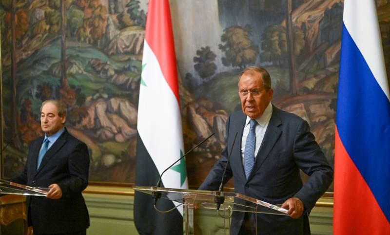 Russia's Foreign Minister Sergey Lavrov, right, and Syrian Foreign Minister Faisal Mekdad at a news conference in Moscow on August 23. EPA
