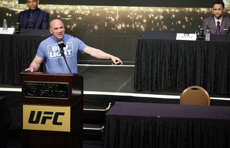 UFC president Dana White speaks beside an empty chair where Conor McGregor was supposed to sit during a news conference for UFC 200 on April 22, 2016, in Las Vegas.