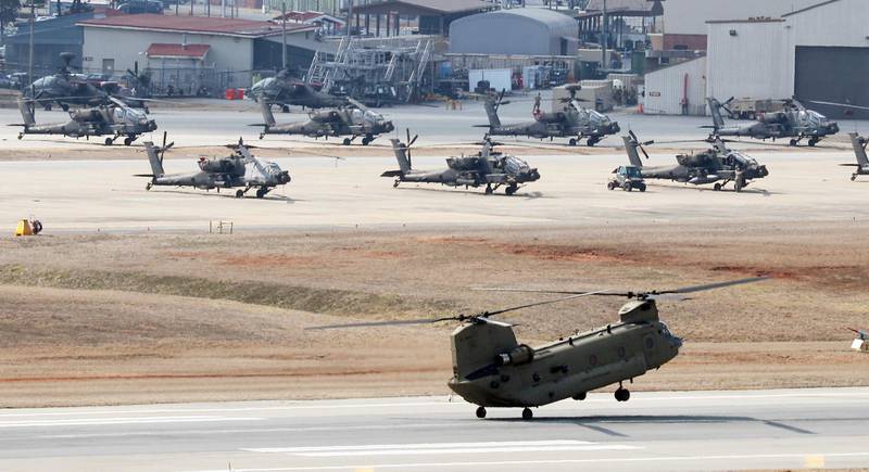 US military helicopters are seen at Camp Humphreys in Pyeongtaek, South Korea. Yonhap via AP