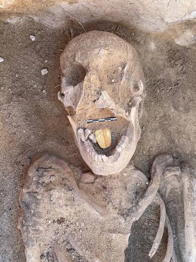 A mummy with a gold foil amulet in the shape of a tongue in its mouth, found at the Taposiris Magna Temple in western Alexandria, Egypt. EPA
