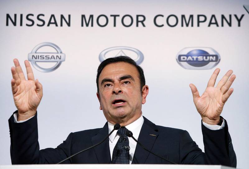 (FILES) In this file photo taken on November 1, 2013, Japan's auto giant Nissan Motor president Carlos Ghosn announces the company's first half financial result ended September at the company's headquarters in Yokohama, suburban Tokyo. Nissan board members have sacked disgraced Carlos Ghosn as chairman, local media reported on November 22, 2018, which would be a spectacular fall from grace for the once-revered boss whose arrest for financial misconduct stunned the car industry and the business world. / AFP / JIJI PRESS / JIJI PRESS
