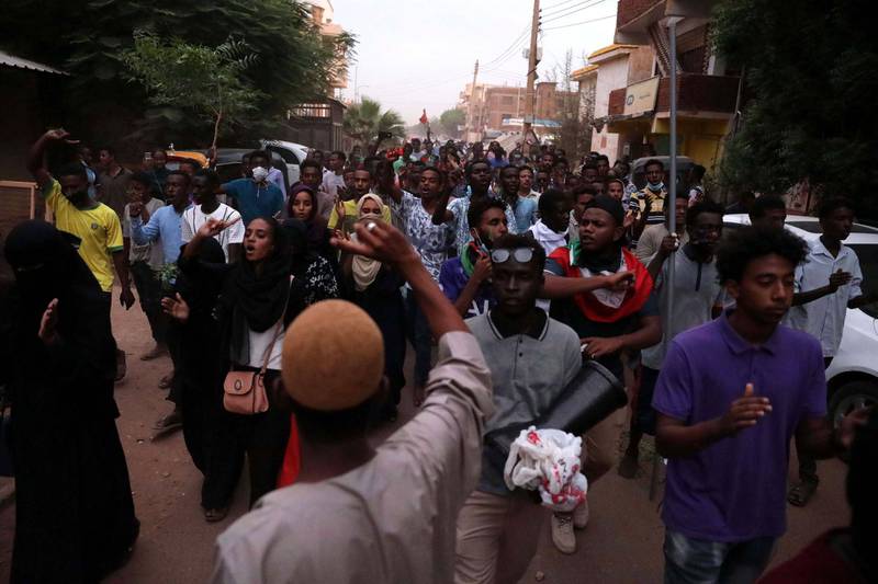 epa07746291 Sudanese protesters chant slogans as they protest against the outcomes of the investigation into crackdown on protest camp in Khartoum, Sudan, 28 July 2019. According to reports, Sudanese prosecutor announced the results of the investigation into the crackdown on protesters camp that occurred on 03 June and resulted in the death of at least 87 people. Eight Sudanese officers are facing charges of 'committing crimes against humanity', however protesters are calling for an independent investigation into the crackdown, which they claim caused the death of some 130 protesters.  EPA/MARWAN ALI