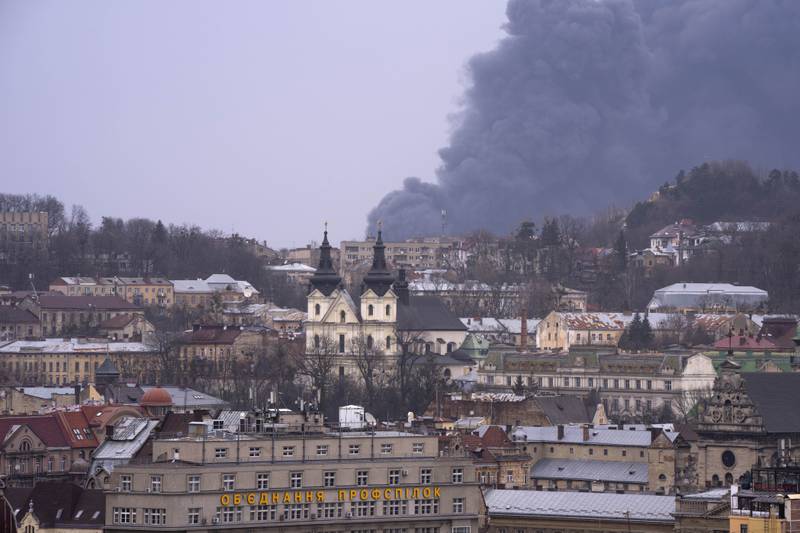 Smoke rises in Lviv, western Ukraine, on Saturday. AP Photo