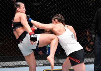 LAS VEGAS, NEVADA - FEBRUARY 13: (R-L) Alexa Grasso of Mexico punches Maycee Barber in their flyweight fight during the UFC 258 event at UFC APEX on February 13, 2021 in Las Vegas, Nevada. (Photo by Jeff Bottari/Zuffa LLC) *** Local Caption *** LAS VEGAS, NEVADA - FEBRUARY 13: (R-L) Alexa Grasso of Mexico punches Maycee Barber in their flyweight fight during the UFC 258 event at UFC APEX on February 13, 2021 in Las Vegas, Nevada. (Photo by Jeff Bottari/Zuffa LLC)