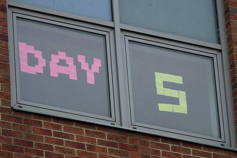 Messages are placed in the windows of student accommodation in the areas surrounding Northumbria University. Ian Forsyth / Getty