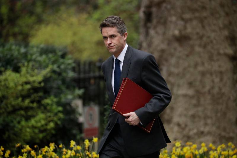 FILE - In this Tuesday, April 2, 2019 file photo, Britain's Defence Secretary Gavin Williamson arrives for a cabinet meeting in 10 Downing Street, London. British Defense Secretary Gavin Williamson has been fired Wednesday, May 1 after an investigation into leaks from a secret government meeting about Chinese telecoms firm Huawei. Prime Minister Theresa May's office says May has "lost confidence" in Williamson. (AP Photo/Matt Dunham)