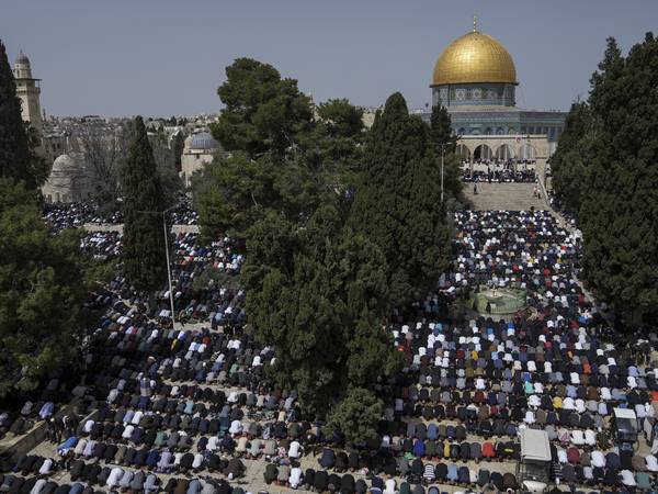 Muslims offer prayer on the first Friday of Ramadan outside the Dome of Rock Mosque at Al Aqsa compound in Jerusalem's Old City. AP