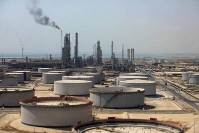 Crude oil storage tanks stand at the oil refinery operated by Saudi Aramco in Ras Tanura, Saudi Arabia, on Monday, Oct. 1, 2018. Saudi Aramco aims to become a global refiner and chemical maker, seeking to profit from parts of the oil industry where demand is growing the fastest while also underpinning the kingdom’s economic diversification. Photographer: Simon Dawson/Bloomberg