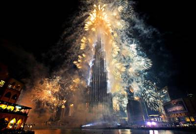 Dubai - January 4, 2010 - Fireworks light up the Burj Khalifa during the opening ceremonies in Dubai, January 4, 2010. (Photo by Jeff Topping/The National)  EDITORS NOTE: Building was opened at 8pm on January 4th, 2010 at which point the name changed from Burj Dubai to Burj Khalifa. Official name is now Burj Khalifa *** Local Caption ***  JT008-0104-BURJ KHALIFA_MG_9737.jpg