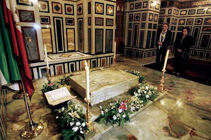 Farah Diba, left, widow of the late shah of Iran, and Jihan Sadat, widow of Egypt's assassinated president Anwar Sadat, attend a ceremony at the shah's tomb in Cairo's Al Rifa'i Mosque.