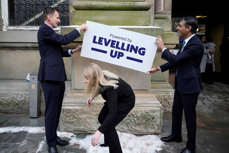 Prime Minister Rishi Sunak, right, and Chancellor of the Exchequer Jeremy Hunt visited Accrington on Thursday to promote the government's 'Levelling Up' campaign. AFP