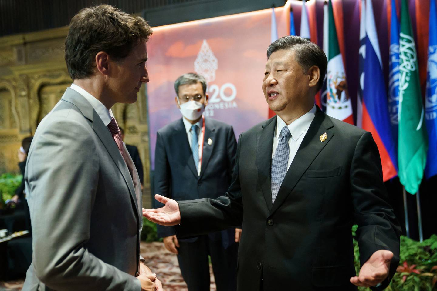 Chinese President President Xi Jinping speaks with Canadian Prime Minister Justin Trudeau at the G20 summit in Bali, Indonesia. Reuters