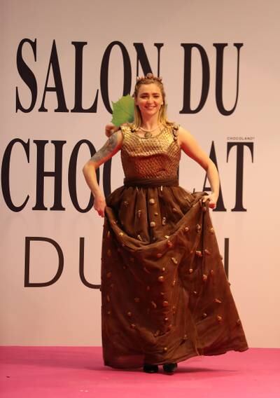 The fashion show featured models wearing dresses crafted from chocolate.