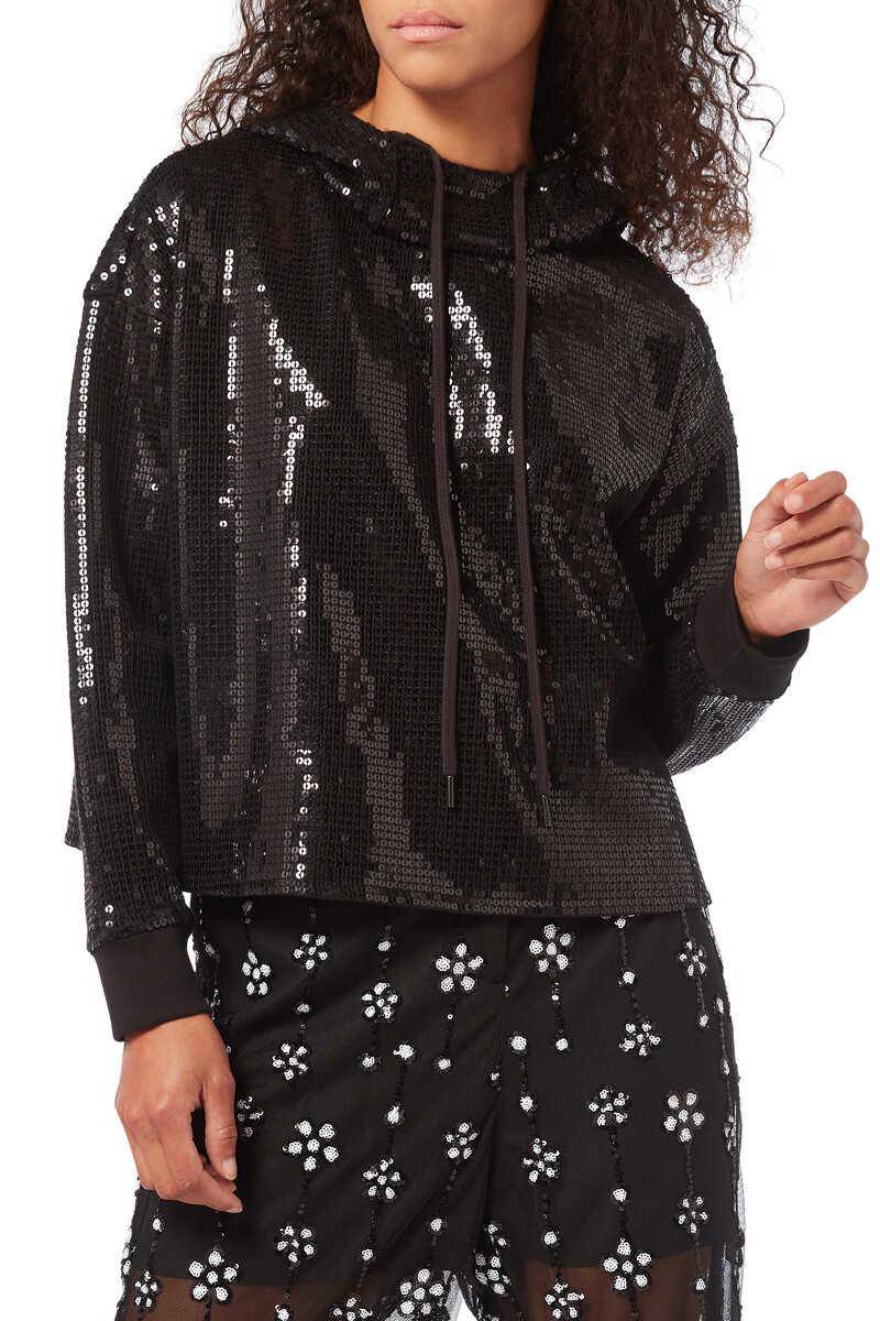 If all-singing, all-dancing tinsel jumpers aren't your thing, this black sequinned hoodie could be for you, Dh785, Alice + Olivia at Bloomingdale’s