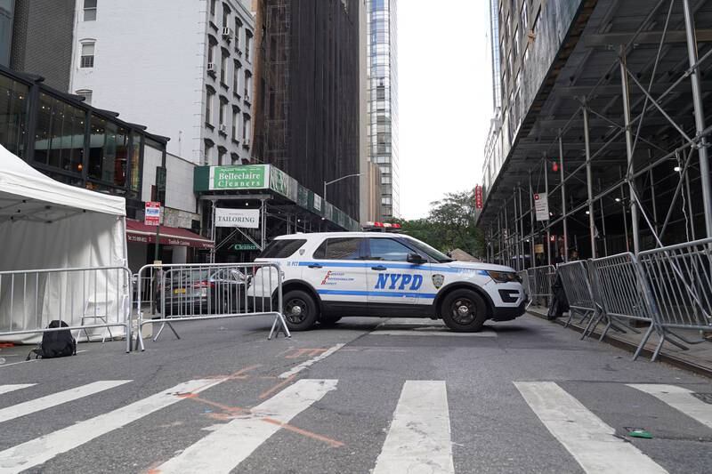 An NYPD SUV blocks a street in Midtown Manhattan. Willy Lowry / The National