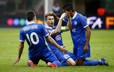 Ruslan Rotan celebrates scoring the second goal for Dnipro with Leo Matos and Yevhen Konoplyanka. Kai Pfaffenbach / Reuters / May 27, 2015