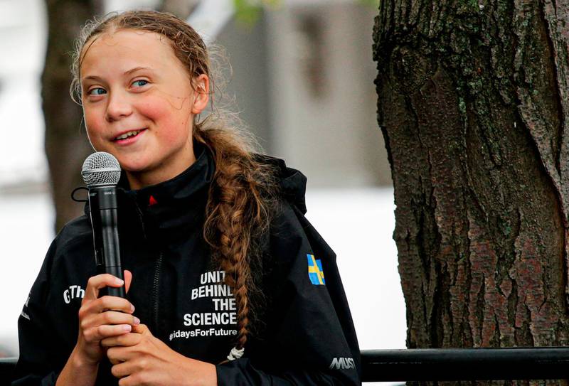 Swedish climate activist Greta Thunberg, 16, speaks after a 15-day journey crossing the Atlantic on August 28, 2019 in New York.   AFP / Kena Betancur