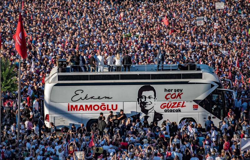 Mr Imamoglu addresses his supporters. AFP