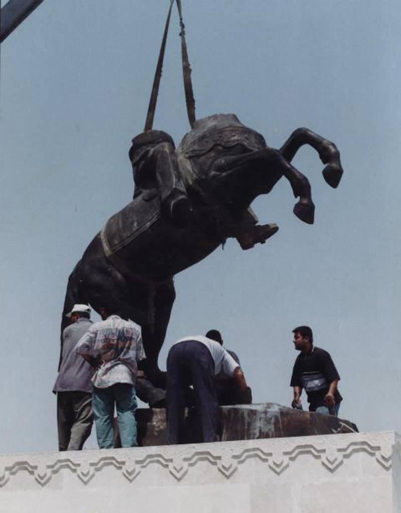Saddam Hussein on a horse being placed at the town of Tharthar in the late 1990s.  Courtesy Natiq Al Alousi