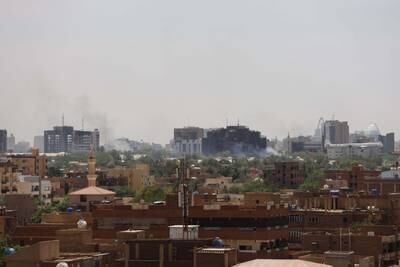 Smoke rises above Khartoum. Faiz Abubakr / The National