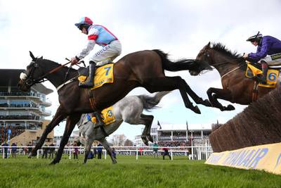 Jockey Gavin Sheehan, riding Saint Calvados, jumps the last fence during the Ryanair Chase on Day 3 of the Cheltenham Festival, on Thursday March 12. Getty