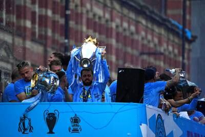 Manchester City's Bernardo Silva lifts the Premier League trophy. PA 