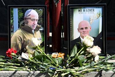 Portraits of Yevgeny Prigozhin and Dmitry Utkin were left at a makeshift memorial in Novosibirsk, Russia. AFP