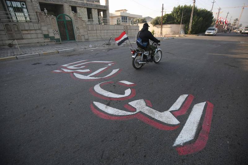 A slogan reading in Arabic "Death to America" is painted on the ground in the Iraqi capital Baghdad. AFP