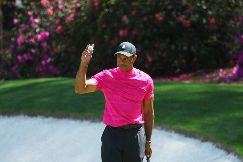 Woods after making birdie on the 13th green. AFP