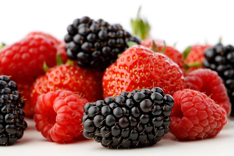 Fresh Mixed berries - strawberries, blackberries and raspberries isolated on white background (iStockphoto.com)