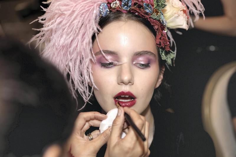 A model has her make up done before the Dubai Mall runway show. Courtesy Dolce & Gabbana