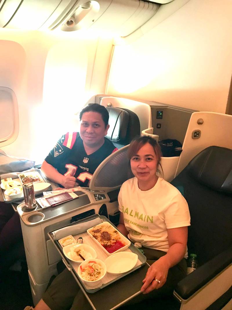 Nurses Carlos Abungan and Sheryl Alipio Pascua relax after their mid-flight heroics.
 