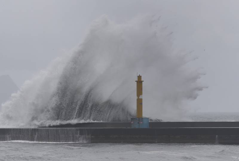 Large waves crash against the breakwaters in Taiwan's Yilan County. AP
