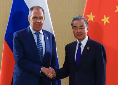 Russian Foreign Minister Sergei Lavrov with Chinese Foreign Minister Wang Yi. EPA