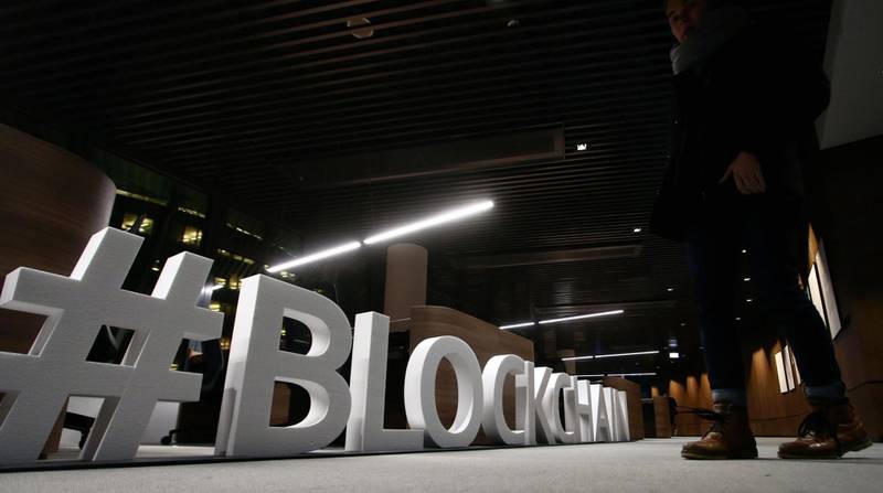 Giant letters, reading the word "blockchain", are displayed at the blockchain centre, which aims at boosting start-ups, on February 7, 2018 in Lithuania's capital Vilnius.
Britain's divorce with the European Union is paying off for Lithuania as it strives to become a northern European hub for financial technology, or "fintech" firms, and blockchain-based start-ups. European Parliament member and entrepreneur Antanas Guoga launched the blockchain centre in Vilnius to boost start-ups and establish connections with Asia and Australia. / AFP PHOTO / Petras Malukas