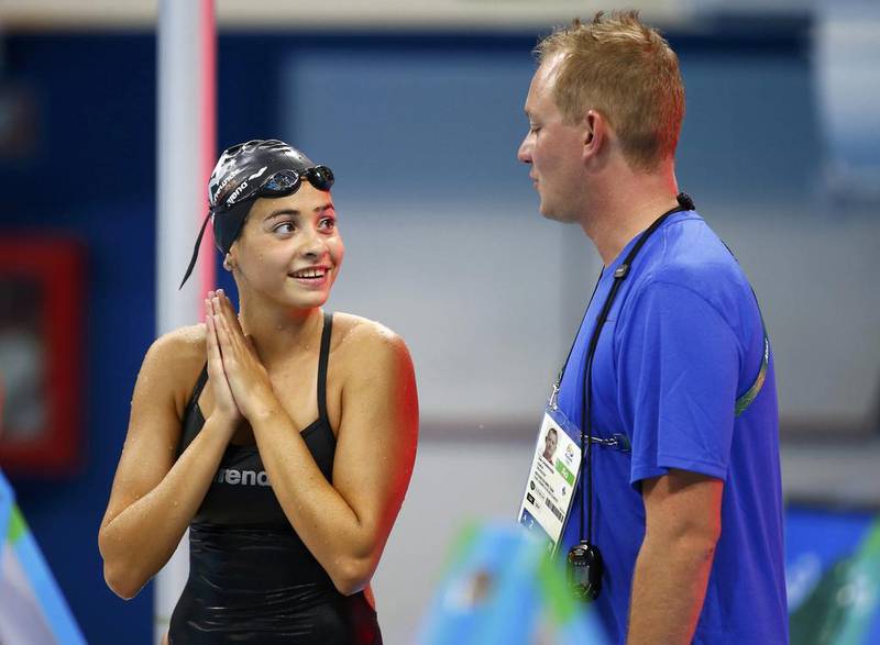 Refugee team swimmer Yusra Mardini, 18, from Syria with her German coach Sven Spannekrebs at the Olympic swimming venue in Rio de Janeiro, August 4, 2016. Michael Dalder / Reuters.