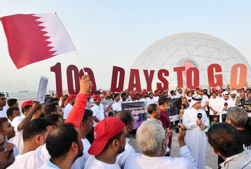 Soccer fans cheer during a ceremony in Doha on August 12 to mark 100 days until the start of the Qatar 2022 Fifa World Cup. EPA