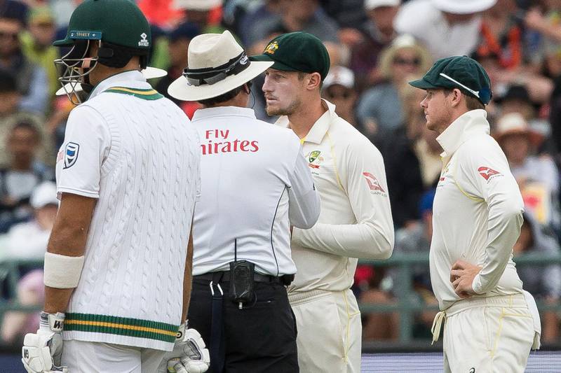 Cameron Bancroft of Australia talks to the umpire on the third day of the third cricket test between South Africa and Australia at Newlands Stadium, in Cape Town, South Africa, Saturday, March 24, 2018. (AP Photo/Halden Krog)