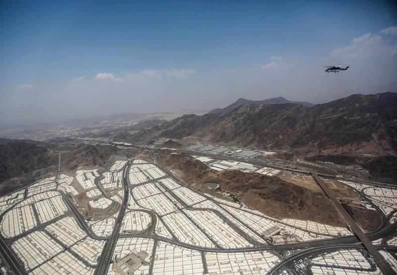 FILE - In this Sept. 25 2015 file photo, tents for pilgrims attending the annual hajj pilgrimage are seen from a helicopter over Mina, Saudi Arabia. On the second day of the hajj, after spending the night in the massive valley of Mina, the pilgrims head to Mount Arafat, some 20 kilometers (12 miles) east of Mecca, for the pinnacle of the pilgrimage. (AP Photo/Mosa'ab Elshamy, File)
