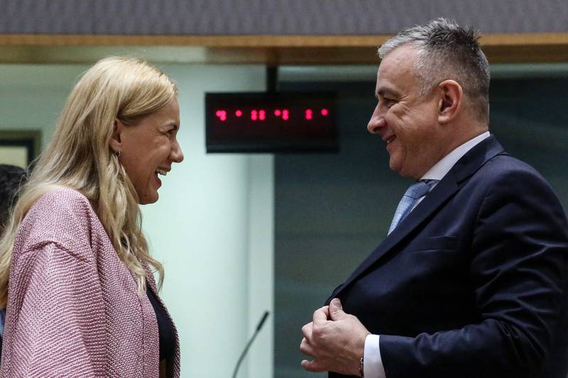 Kadri Simson (L), European Energy Commissioner, speaks to Czech minister Jozef Sikela before a meeting in Brussels. AFP