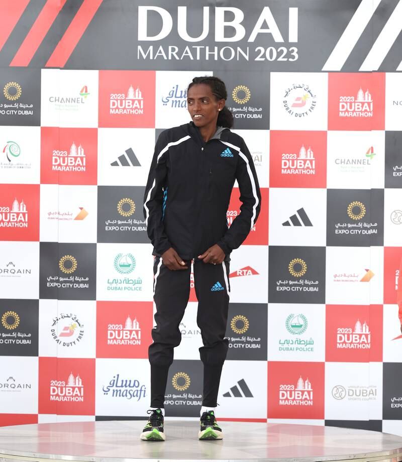 Dera Dida on the podium  after winning the Dubai Marathon 2023. Getty