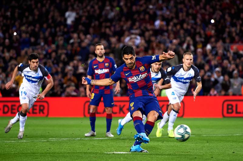 Luis Suarez scores Barca's fourth with a penalty. Getty